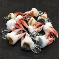 Pulled tooth pendant